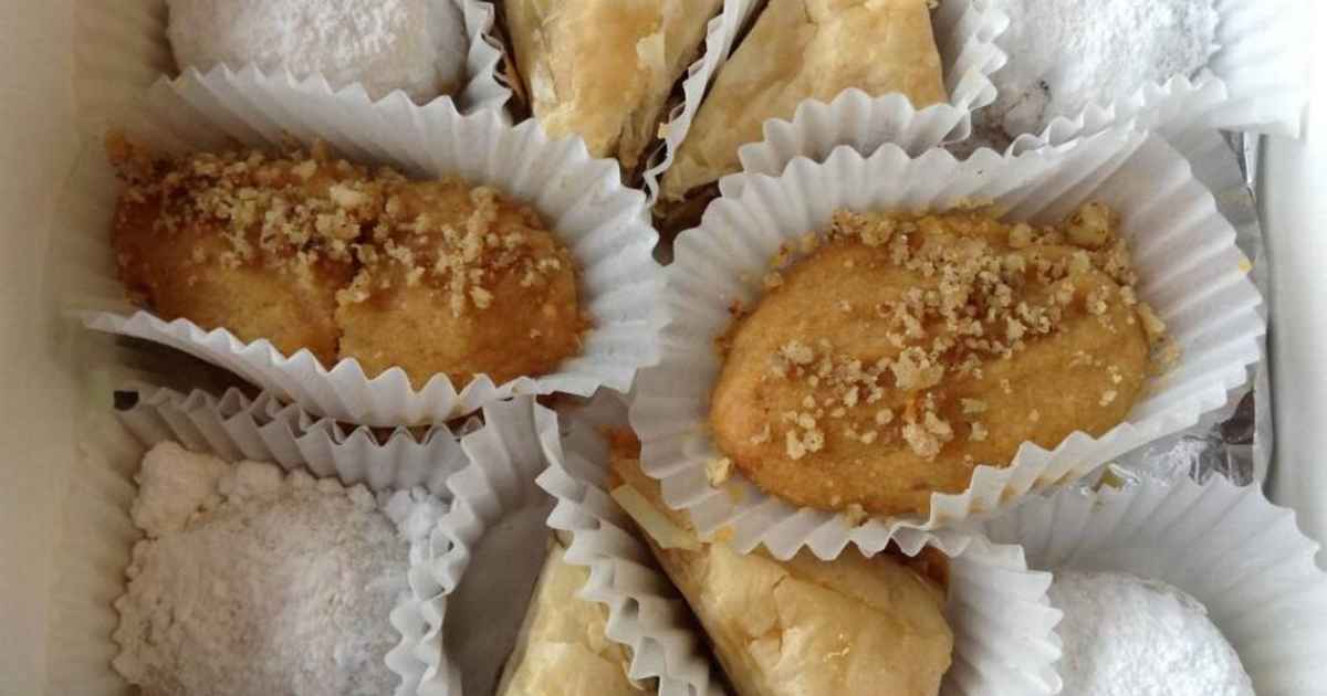 Pastry box with baklava, melomakarona, and kourambiethes